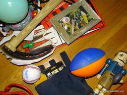 (LR) TOY LOT; INCLUDES A SOFT FOAM FOOTBALL, A TONKA SPIN OUT SPIT MOTOR, A FOOTBALL THEMED