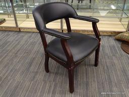 OFFICE ARM CHAIR; BLACK LEATHER, MAHOGANY, AND BRASS STUDDED OFFICE ARM CHAIR IN EXCELLENT