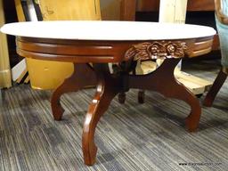 VICTORIAN MARBLE TOP COFFEE TABLE; HAS A WHITE MARBLE TOP AND MAHOGANY BONES WITH FLORAL CARVED