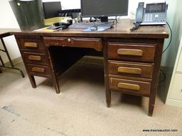 (RM2) VINTAGE WOODEN 6 DRAWER OFFICE DESK. MEASURES 60" X 34" X 30".