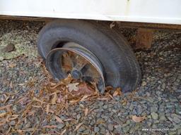 WHITE CONTRACTOR OFFICE TRAILER. RUSTED, NEEDS TIRES. PLEASE SEE PICTURES FOR CONDITION. COME