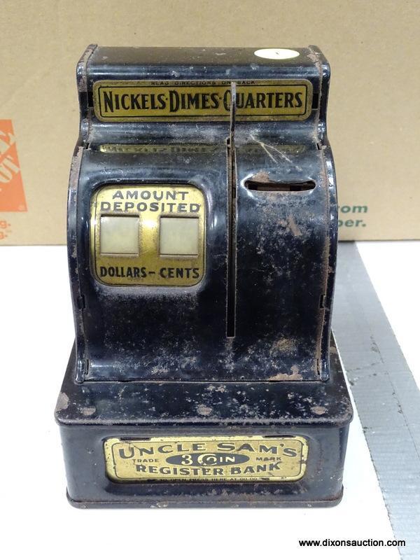 COIN BANK; VINTAGE CASH REGISTER SHAPED COIN BANK IN GOOD WORKING CONDITION. HAS SOME WEAR.