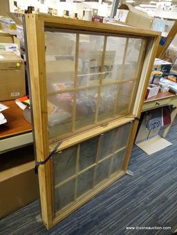 PELLA WINDOW; DOUBLE PANED CASED WINDOW IN BLACK. MEASURES 37 IN X 5 IN X 55 IN