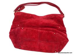 KATE SPADE RED SUEDE LEATHER HOBO BAG WITH TASSEL ZIPPER, SMALL SIDE POCKETS, AND STRIPED LINING.