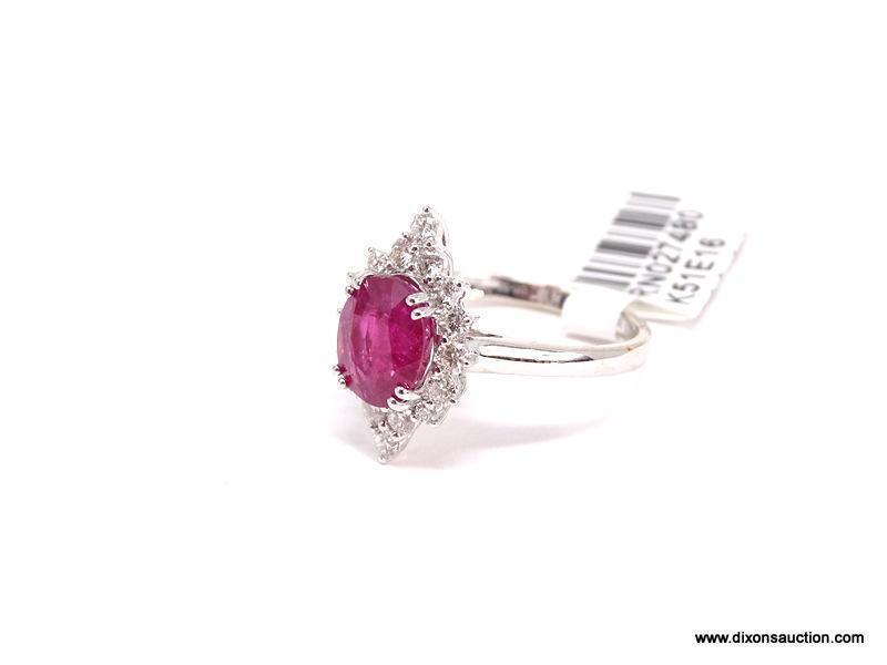 18K WHITE GOLD RUBY & DIAMOND RING. THE RING IS MOUNTED WITH 1 GENUINE NATURAL RUBY CENTER STONE