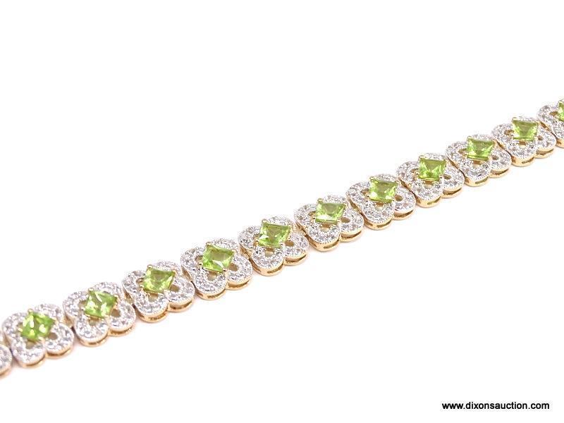 .925 SILVER PERIDOT & WHITE TOPAZ BRACELET WITH YELLOW GOLD OVERLAY. 19 SQUARE PERIDOT APPROX.