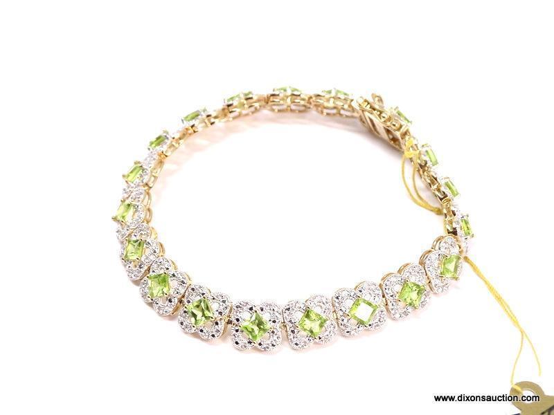 .925 SILVER PERIDOT & WHITE TOPAZ BRACELET WITH YELLOW GOLD OVERLAY. 19 SQUARE PERIDOT APPROX.