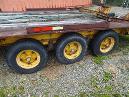 HEAVY DUTY 20' FLATBED 6-WHEELED EQUIPMENT TRAILER WITH RAMPS. HEAVILY RUSTED AND WOOD FLOOR NEEDS