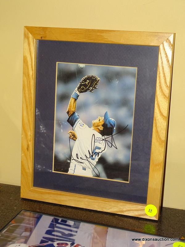 (BAS) FRAMED, MATTED, AND AUTOGRAPHED PHOTO OF GEORGE BRETT (KANSAS CITY ROYALS) IN A PINE FRAME