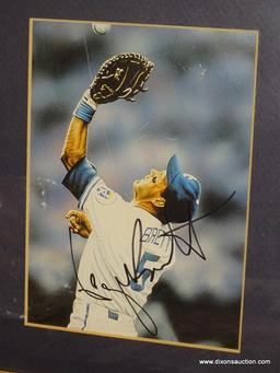 (BAS) FRAMED, MATTED, AND AUTOGRAPHED PHOTO OF GEORGE BRETT (KANSAS CITY ROYALS) IN A PINE FRAME