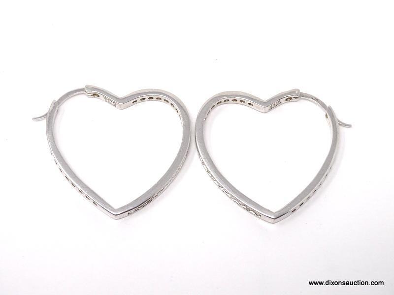 PAIR OF .925 STERLING SILVER HEART SHAPED PIERCED EARRINGS WITH CZ STONES DOWN THE SIDE. WEIGHS