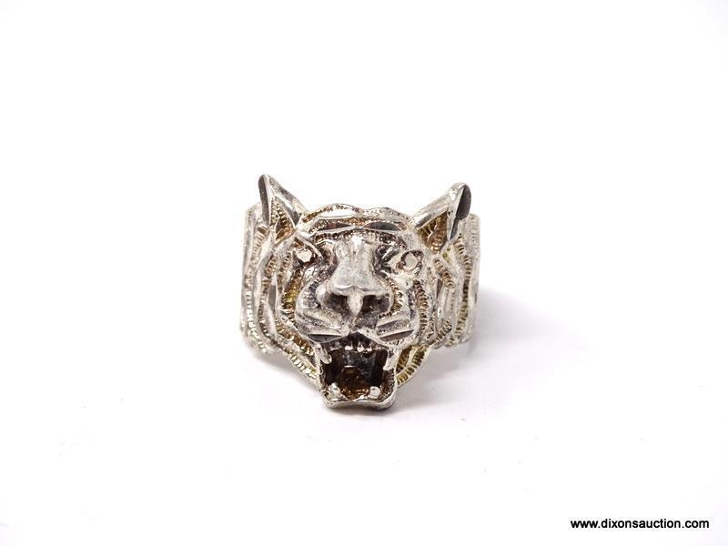 .925 STERLING SILVER OPEN MOUTH TIGER RING. MARKED ON THE INSIDE "925". WEIGHS APPROX. 7.83 GRAMS.