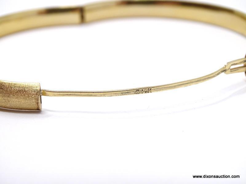 VINTAGE 14K YELLOW GOLD BANGLE BRACELET. MARKED ON THE ON THE CLASP. WEIGHS APPROX. 7.15 GRAMS. DOES