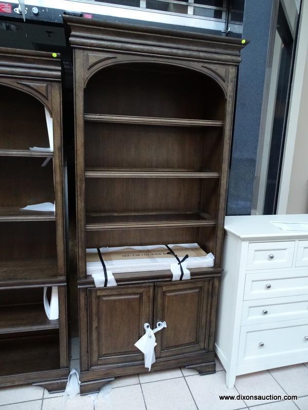 ARCADIA LIGHTED DOOR BOOKCASE WITH 3 GLASS SHELVES. QUALITY AND WORLD CLASS CRAFTSMANSHIP WAS AT THE