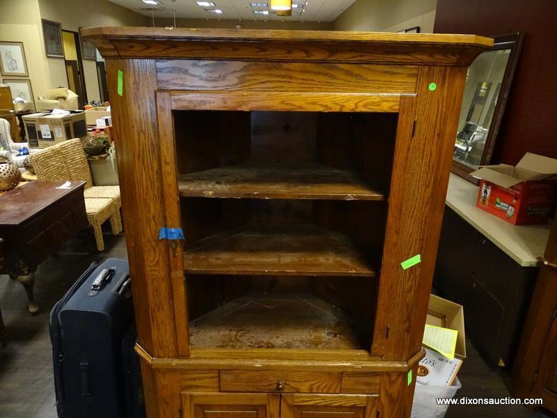 ANTIQUE OAK 2 PIECE CORNER CABINET WITH 2 INTERIOR WOODEN SHELVES, A SINGLE CENTER DRAWER, AND 2