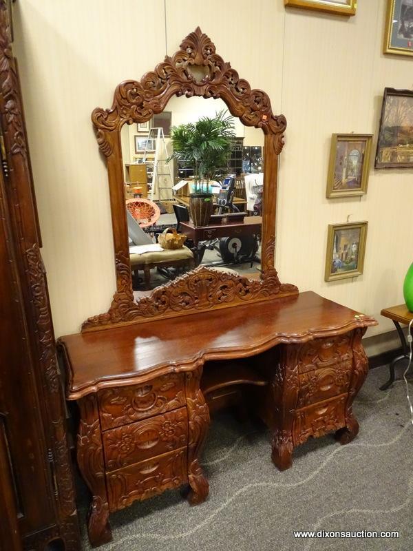 SOLID MAHOGANY HIGHLY CARVED 6 DRAWER VANITY WITH MIRROR. MEASURES 58 IN X 19 IN X 77.5 IN. ITEM IS
