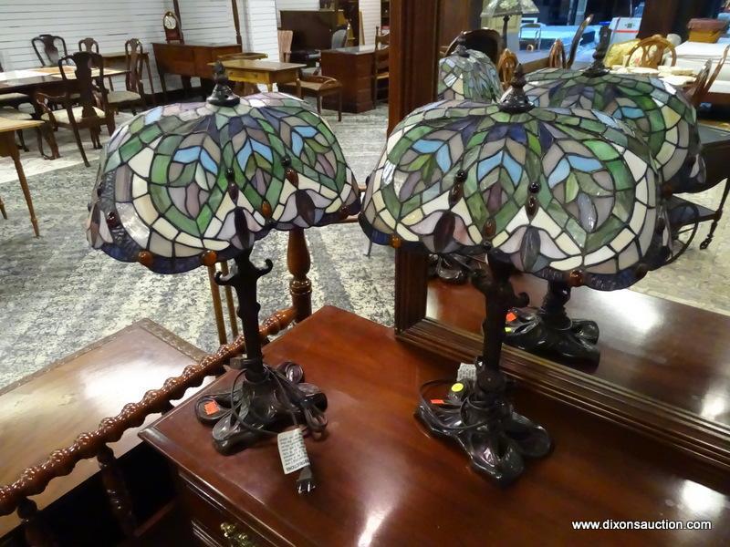 PAIR OF TIFFANY STYLE SLAGGED GLASS LAMPS WITH BRONZE TONED BASES. EACH MEASURES 14 IN X 23 IN. ITEM