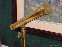 (LR) BRASS SHIPS STYLE TELESCOPE WITH 3 LEGGED BASE. MEASURES 14.5 IN X 20.5 IN. ITEM IS SOLD AS IS