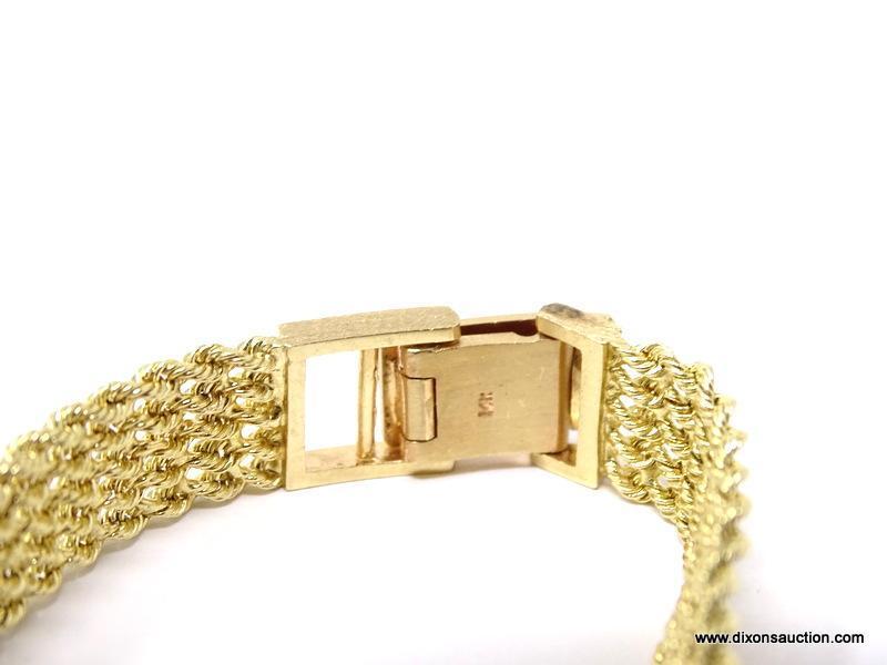 14KT YELLOW GOLD GENEVE QUARTZ WRIST WATCH WITH DIAMOND BEZEL & ROPE TWIST BAND. MEASURES 7-3/4"