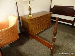 (R1) MAHOGANY TWIN SIZE BED WITH WOODEN RAILS. MEASURES APPROXIMATELY 56 IN X 80 X 55 IN. HAS DAMAGE