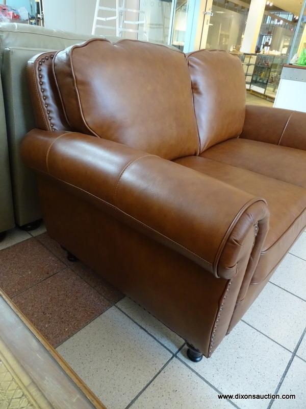 BRAND NEW ABBYSON TOP GRAIN LEATHER 2 CUSHION LOVESEAT WITH BRASS STUDDED ACCENTS AND ROLLED ARMS.