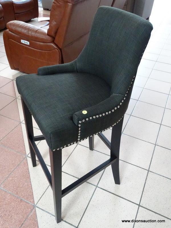 BRAND NEW GRAY UPHOLSTERED BAR CHAIR WITH SILVER TONE STUDDING AROUND THE EDGES. MEASURES 20 IN X 21