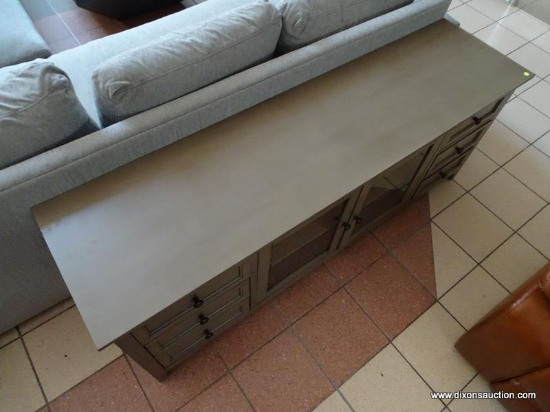 ABBYSON MEDIA CONSOLE IN GRAY. #SS-5430-1340 WITH PAPERWORK. WITH A DESIGN THAT?S CLASSIC YET