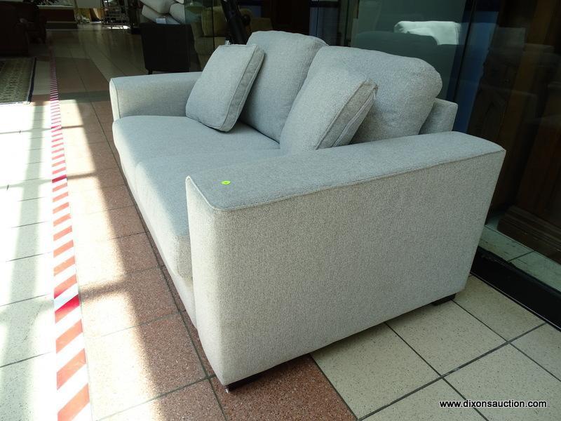 BRAND NEW TAMORA FABRIC LOVESEAT IN GRAY. A MODERN DESIGN COMBINED WITH LUXURIOUS, COMFORTABLE