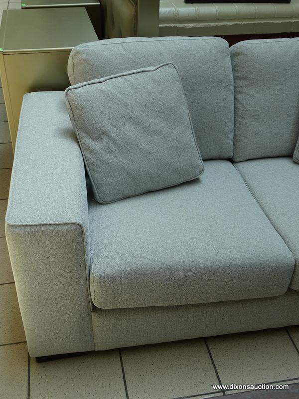 BRAND NEW TAMORA FABRIC LOVESEAT IN GRAY. A MODERN DESIGN COMBINED WITH LUXURIOUS, COMFORTABLE