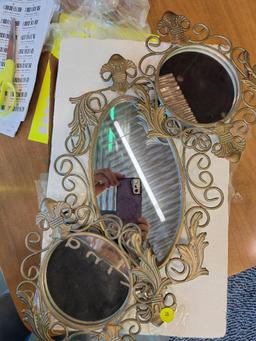 SET OF THREE GOLD TONED METAL WALL MIRRORS - LARGEST BEING 15 INCHES IN LENGTH