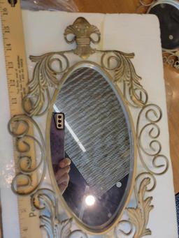 SET OF THREE GOLD TONED METAL WALL MIRRORS - LARGEST BEING 15 INCHES IN LENGTH