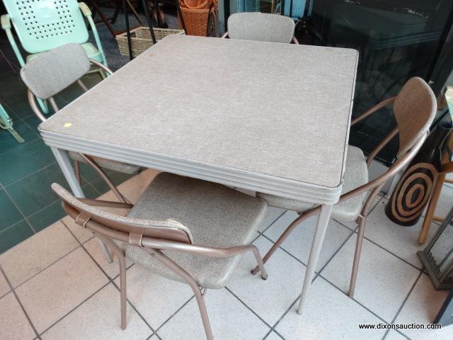 COSTCO 1954 FOLDING CARD TABLE AND FOUR CHAIRS - SOME RUST AND A FEW SMALL TEARS BUT CHAIRS ARE
