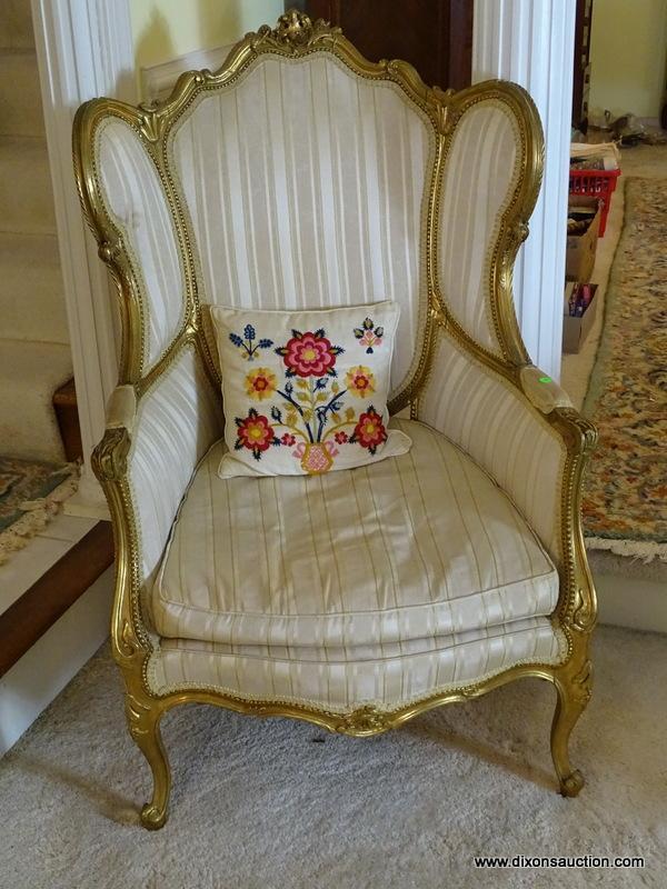 (LR) VINTAGE FRENCH GOLD GILT WING CHAIR, ACANTHUS LEAF CARVING ON ARMS AND WINGS WITH CARVED CENTER