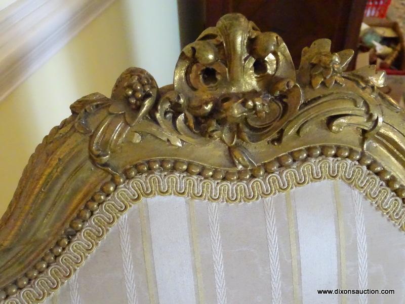 (LR) VINTAGE FRENCH GOLD GILT WING CHAIR, ACANTHUS LEAF CARVING ON ARMS AND WINGS WITH CARVED CENTER