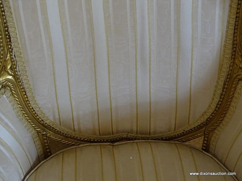 (LR) VINTAGE FRENCH GOLD GILT WING CHAIR, ACANTHUS LEAF CARVING ON ARMS AND WINGS WITH CARVED CENTER