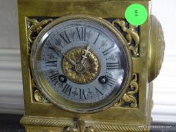 (FOYER) VINTAGE ORNATE BRASS CLOCK WITH 3 KEYS- 5 IN X 5IN X 14 IN ITEM IS SOLD AS IS WHERE IS WITH
