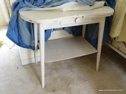 (UPBED 1) PAINTED WHITE KIDNEY SHAPED TABLE WITH TABLE SKIRT- 34 IN X 18 IN X 30 IN, ITEM IS SOLD AS