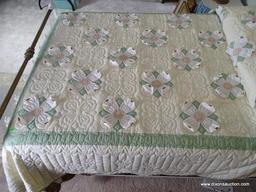 (UPBED 1) FULL SIZE BOX SPRING AND MATTRESS AND INCLUDES LINENS AND HANDMADE DOGWOOD QUILT, ITEM IS