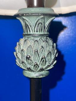 ORNATE METAL BASE LAMPS ONE WITH SCROLL THEME AND ONE WITH PINEAPPLE. TALLEST MEASURES ABOUT 35