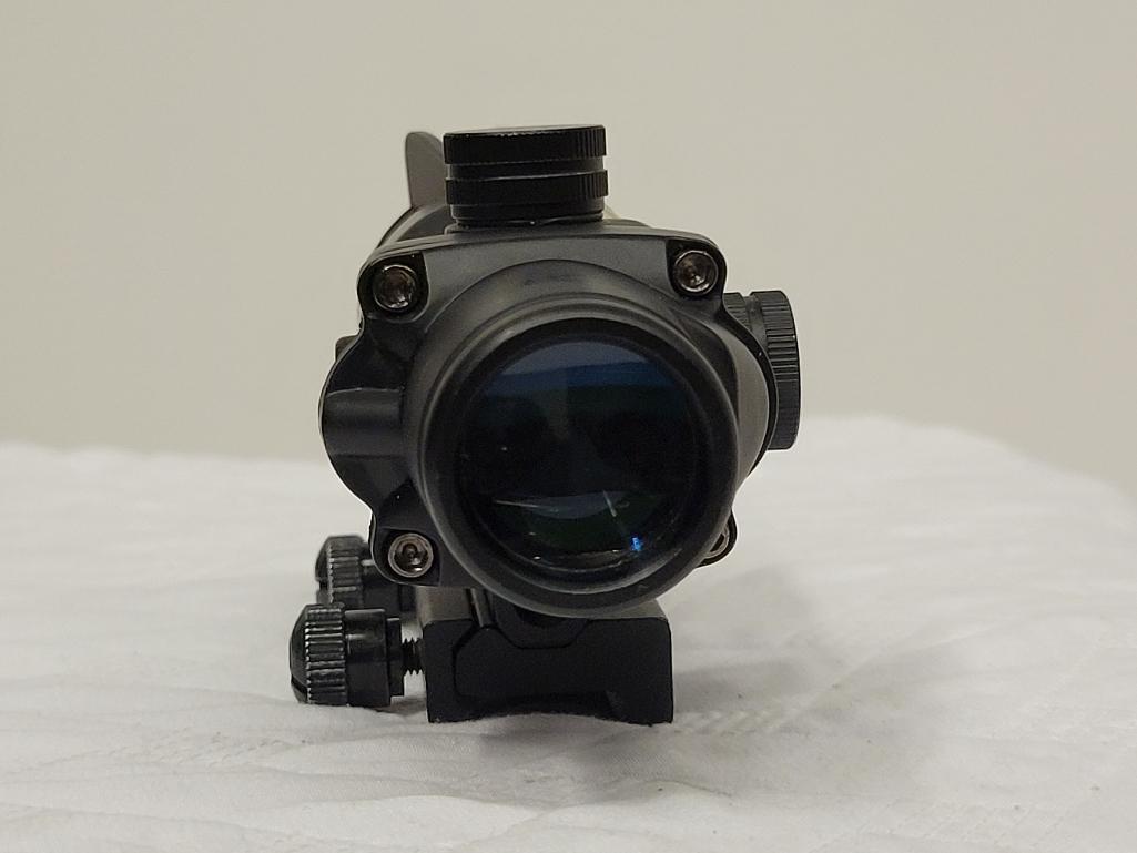 TRIJON ACOG TA31 RIFLE SCOPE. GREAT FOR LONG AND SHORT DISTANCE SHOOTING. RETAILS FOR $1,300.00 NEW.