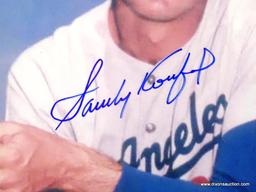 FRAMED AND SIGNED "SANDY KOUFAX" PHOTOGRAPH WITH GOLD TONE FRAME. HAS COA. MEASURES 9.25 IN X 11.25
