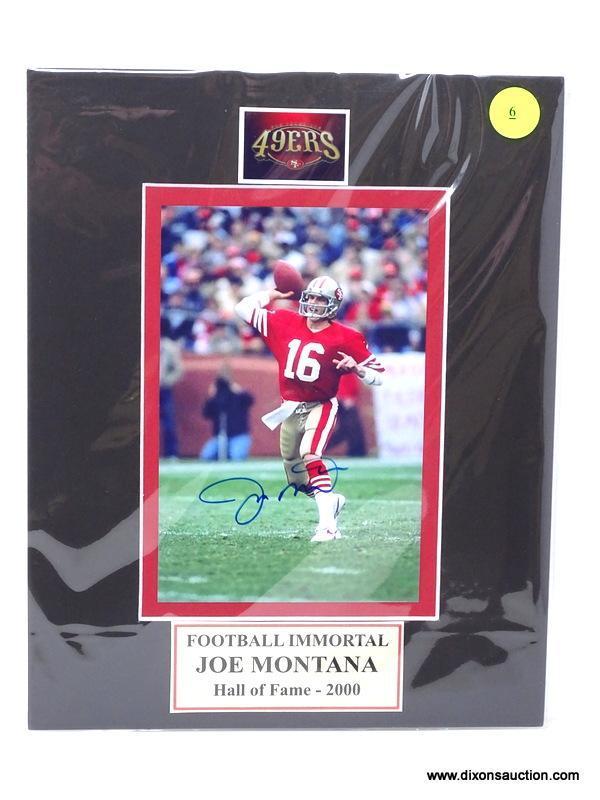 "FOOTBALL IMMORTAL" JOE MONTANA HALL OF FAME (2000) SIGNED PHOTOGRAPH WITH MATTING. MEASURES 8 IN X