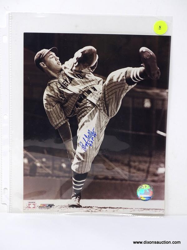 BOB FELLER SIGNED PHOTOGRAPH. MEASURES 8 IN X 10 IN. HAS COA ON THE BACK. ITEM IS SOLD AS IS WHERE