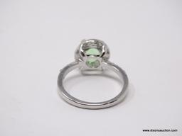 .925 STERLING SILVER LADIES 1 1/2 CT PERIDOT RING. SIZE 8.