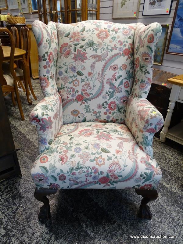 (R1) FLORAL UPHOLSTERED WING BACK CHAIR WITH MAHOGANY BALL & CLAW STYLE FEET. MEASURES 31 IN X 32 IN