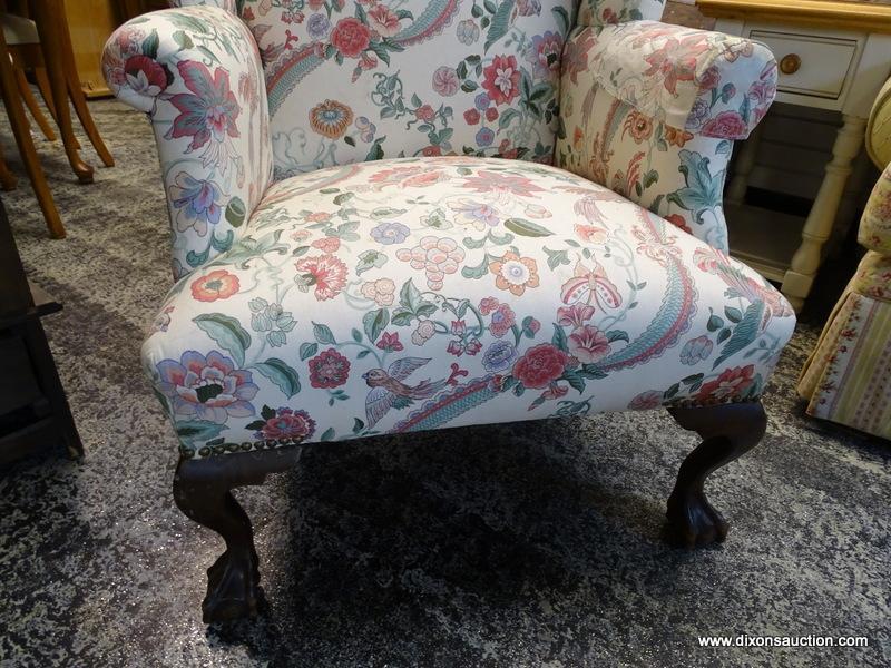 (R1) FLORAL UPHOLSTERED WING BACK CHAIR WITH MAHOGANY BALL & CLAW STYLE FEET. MEASURES 31 IN X 32 IN