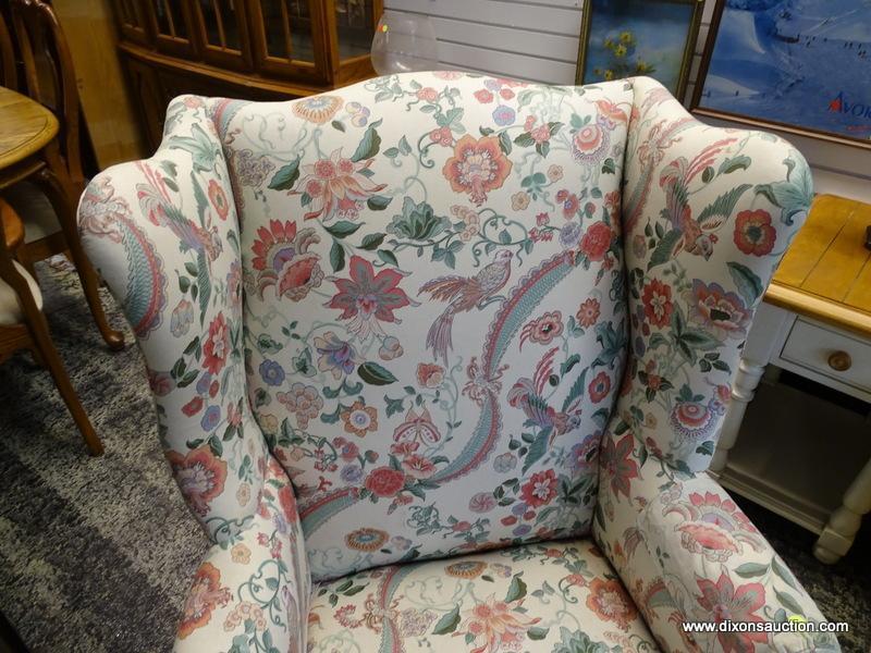 (R1) FLORAL UPHOLSTERED WING BACK CHAIR WITH MAHOGANY BALL & CLAW STYLE FEET. MEASURES 31 IN X 32 IN