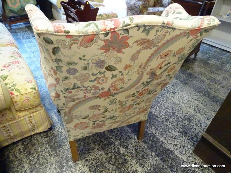 (R1) FLORAL UPHOLSTERED WING BACK CHAIR WITH MAHOGANY BALL & CLAW STYLE FEET. MEASURES 31 IN X 32 IN