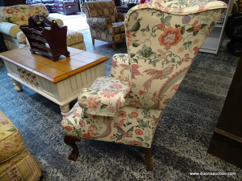 (R1) FLORAL UPHOLSTERED WING BACK CHAIR WITH MAHOGANY BALL & CLAW STYLE FEET. MEASURES 31 IN X 32 IN