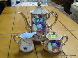 (R1) LEFTON CHINA TEA SET TO INCLUDE A TEA POT, A CREAMER, AND A SUGAR DISH. ALL HAVE A MATCHING